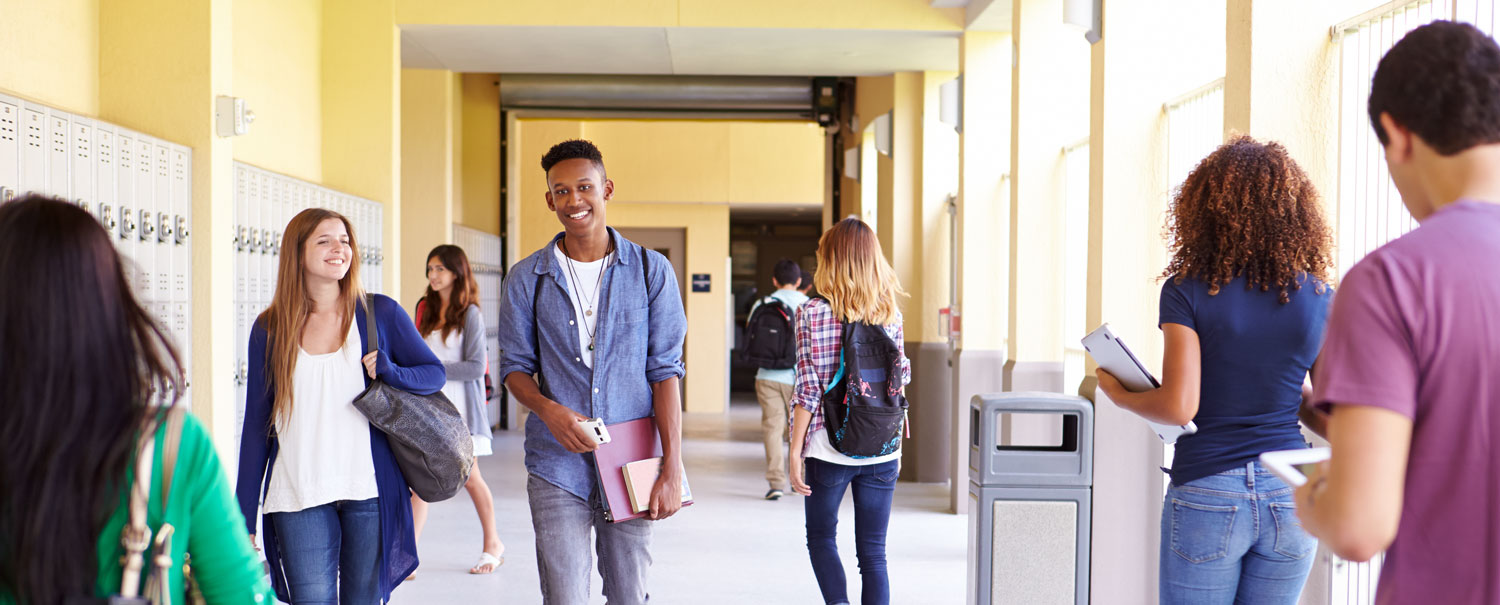 students walking in school hallways