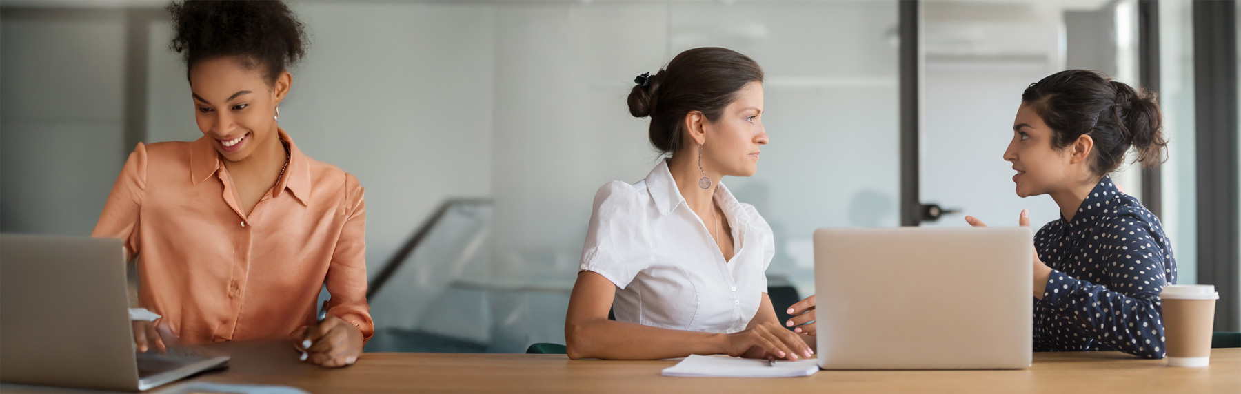 women talking in office