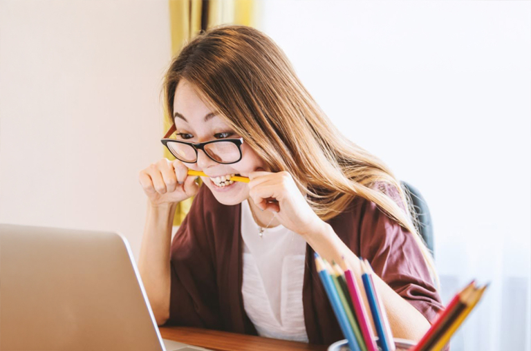 woman frustrated reading email